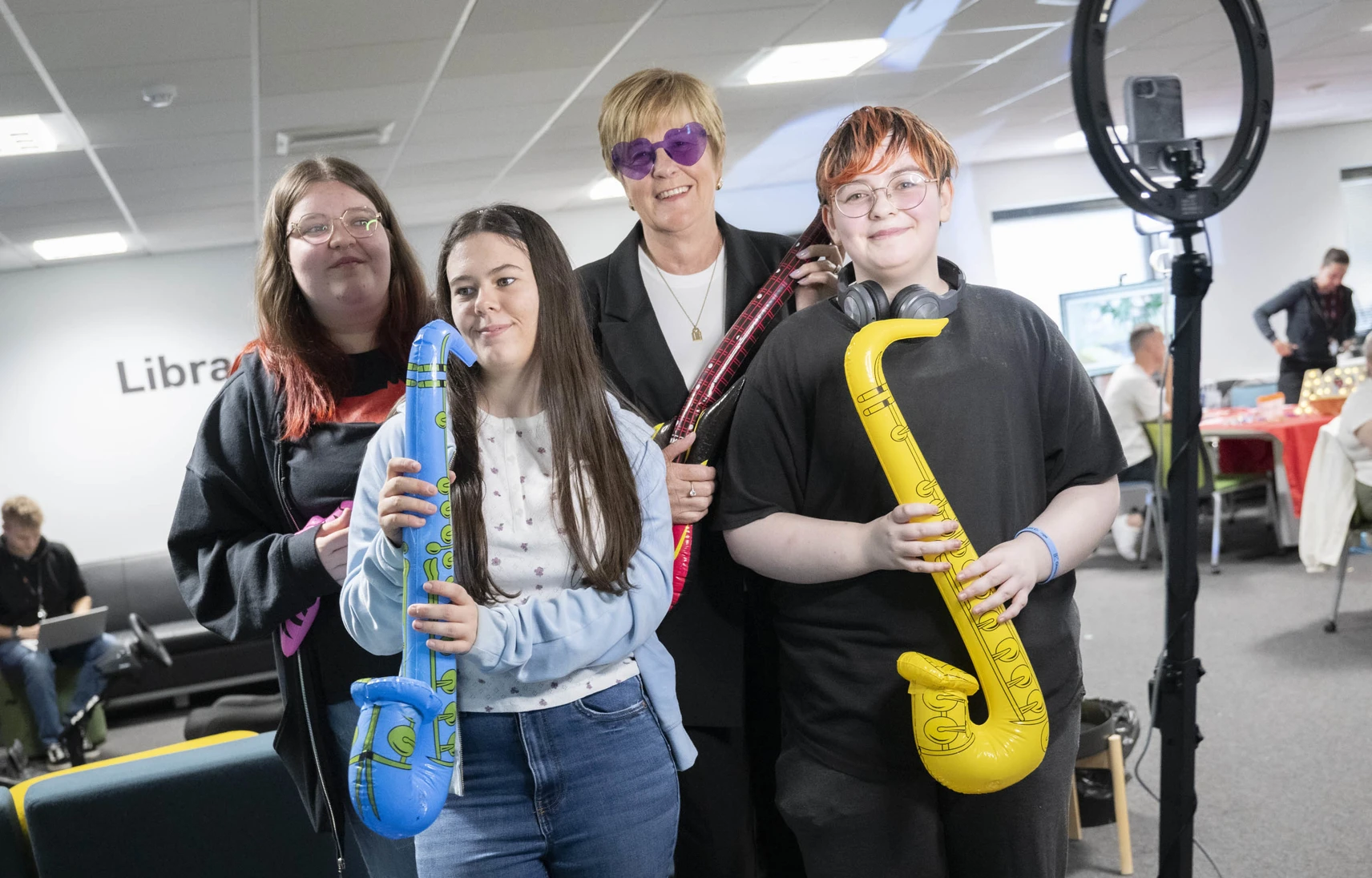 Group of students holding inflatable instruments inside the library area at Easterhouse campus during Freshers’ Fest 2025. Group of students holding inflatable instruments inside the library area at Easterhouse campus during Freshers’ Fest 2025.